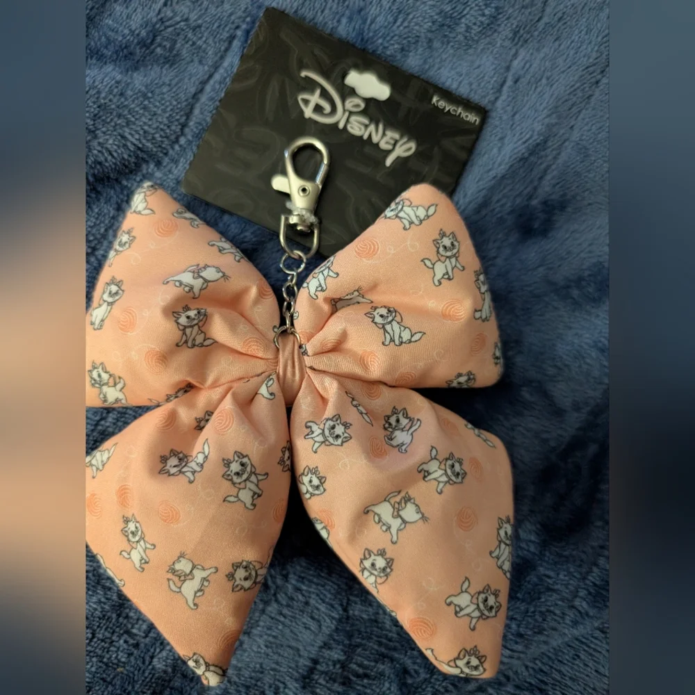 Disney Peach-Pink Marie Bow Keychain with Clip
